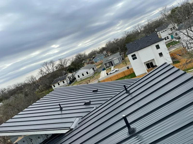 Standing seam metal roof panels with vents for Skylight Repair in Collinsville